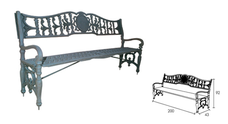 Cast iron bench with armrest.
