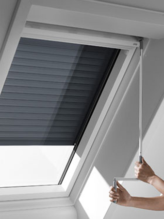 Velux external blinds that reflects heat from the sun in summer 