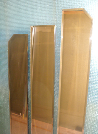 Espejos decoraticos en color bronce.